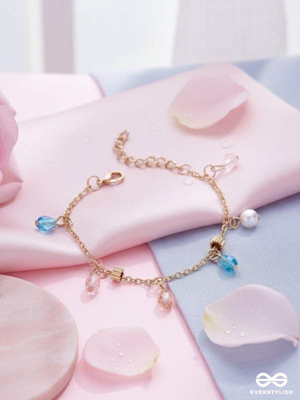 The Shimmering Sleet- Pearl and Crystals Studded Golden Bracelet