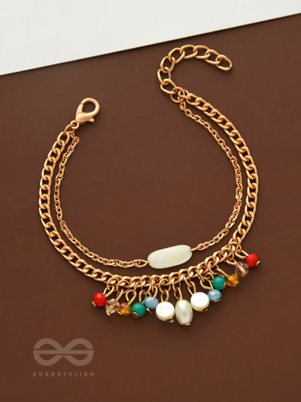 The Divine Galaxy- Pearls and Beads Studded Golden Bracelet