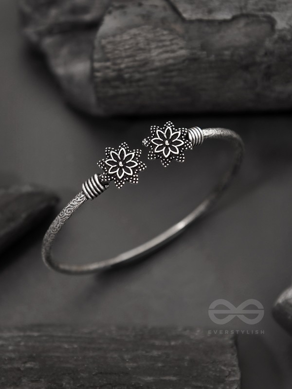 Ups-a-Daisy- Oxidised Bangle Bracelet