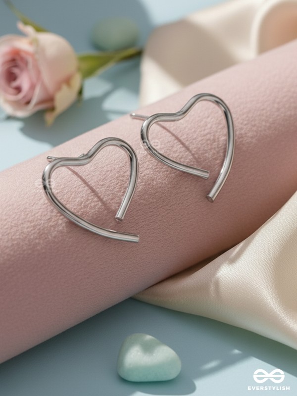 LOVE IN PROGRESS - CASUAL SILVER STUDS