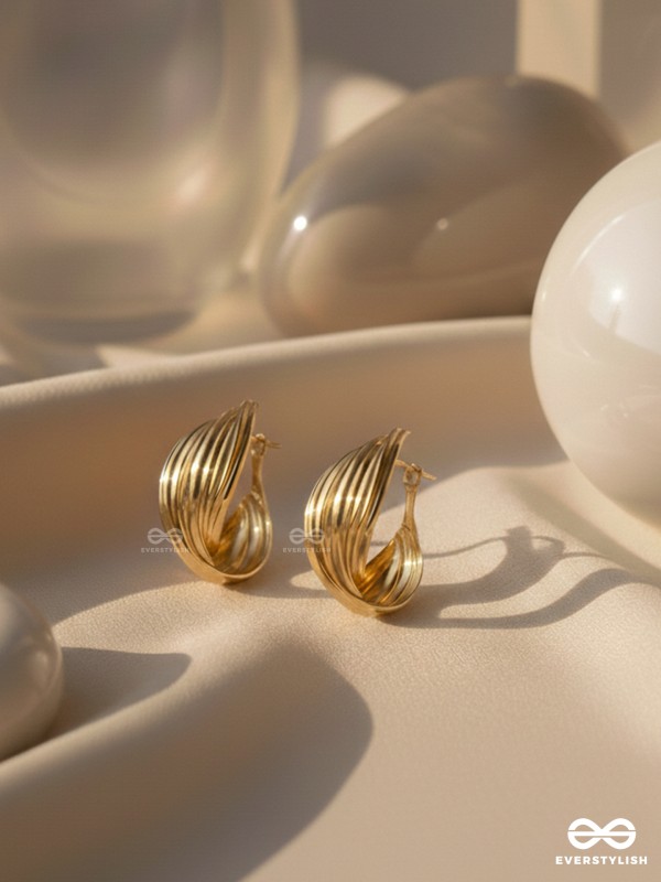 LEVELING IT UP - STATEMENT GOLDEN HOOPS