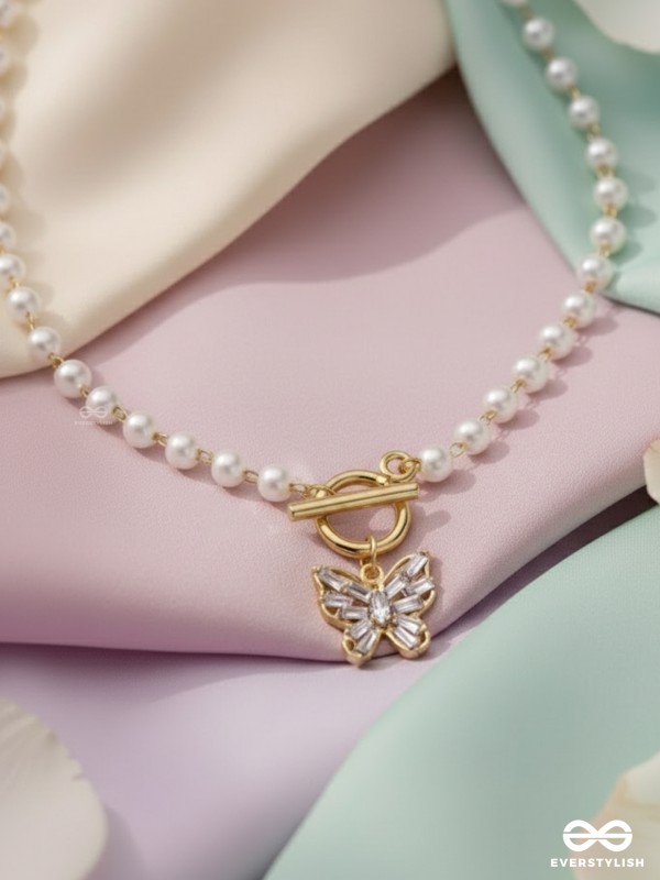 A FLYING MIRACLE - GOLDEN PEARL NECKPIECE