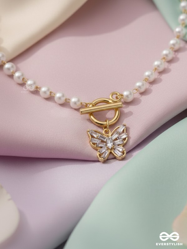 A FLYING MIRACLE - GOLDEN PEARL NECKPIECE