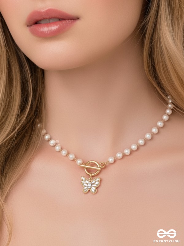 A FLYING MIRACLE - GOLDEN PEARL NECKPIECE