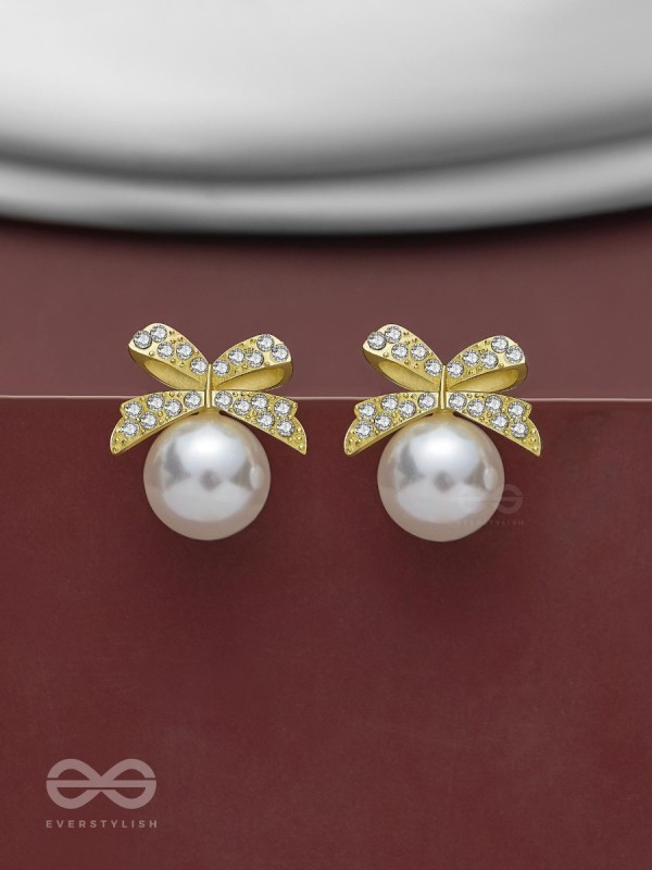 BOW-DAZZLE PEARLS - GOLDEN AND WHITE EMBELLISHED EARRINGS