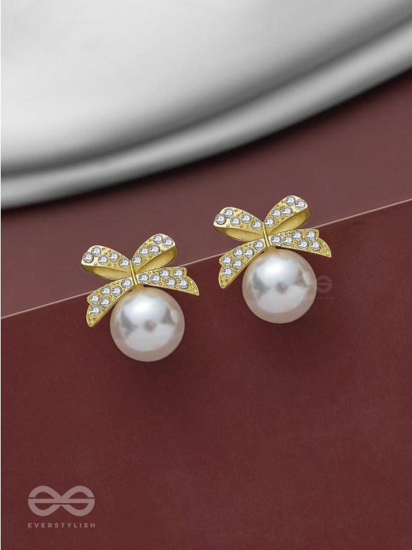 BOW-DAZZLE PEARLS - GOLDEN AND WHITE EMBELLISHED EARRINGS