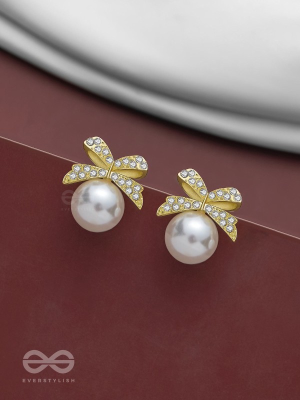 BOW-DAZZLE PEARLS - GOLDEN AND WHITE EMBELLISHED EARRINGS