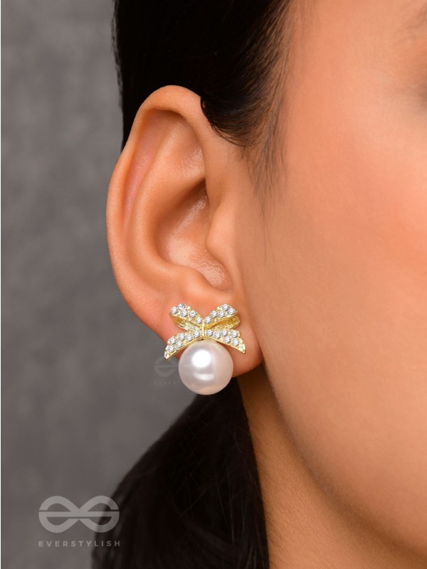 BOW-DAZZLE PEARLS - GOLDEN AND WHITE EMBELLISHED EARRINGS