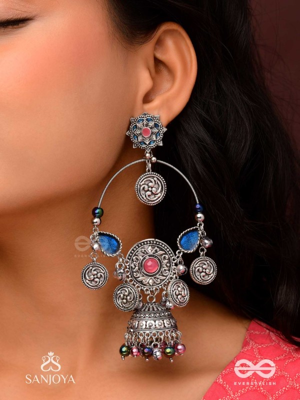SHUBHRAVILASA- RADIANT GRACE- SILVER TONED EARRINGS, CIRCULAR MOTIFS ADORNED WITH GHUNGROOS AND JHUMKA
