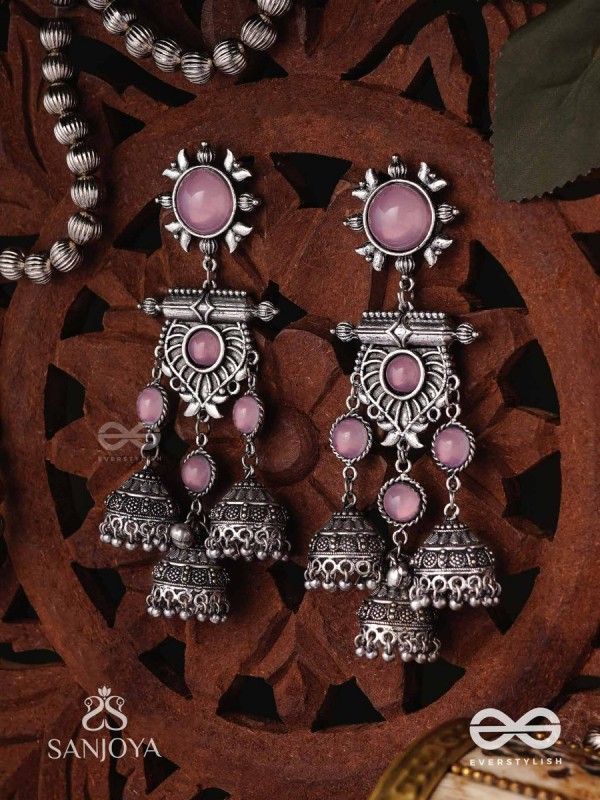 VIJAYAMUKTA-VICTORY PEARLS- REGAL OXIDIZED EARRINGS WITH A CENTRAL PURPLE STONE AND LAYERED JHUMKAS
