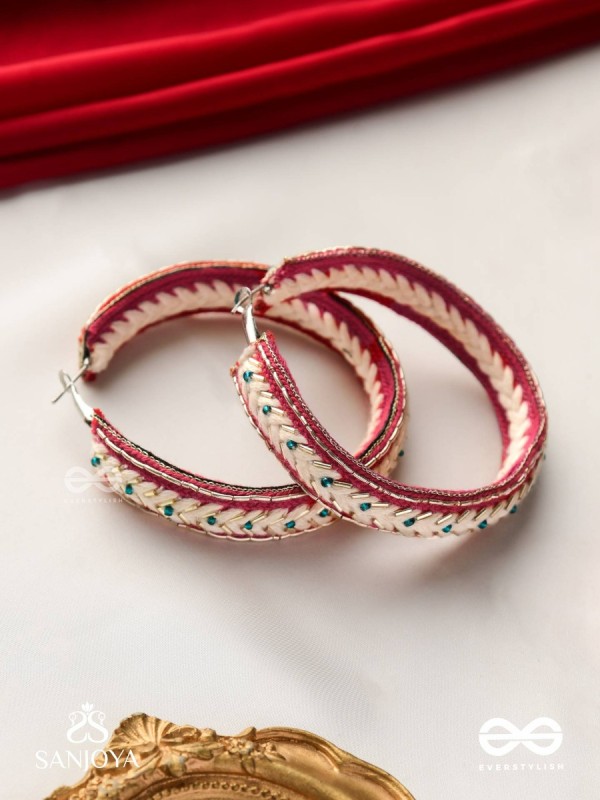 Vasantiruchi- Spring Charm- Embroidered earrings with red and white threads, decorated with beads and gold accents