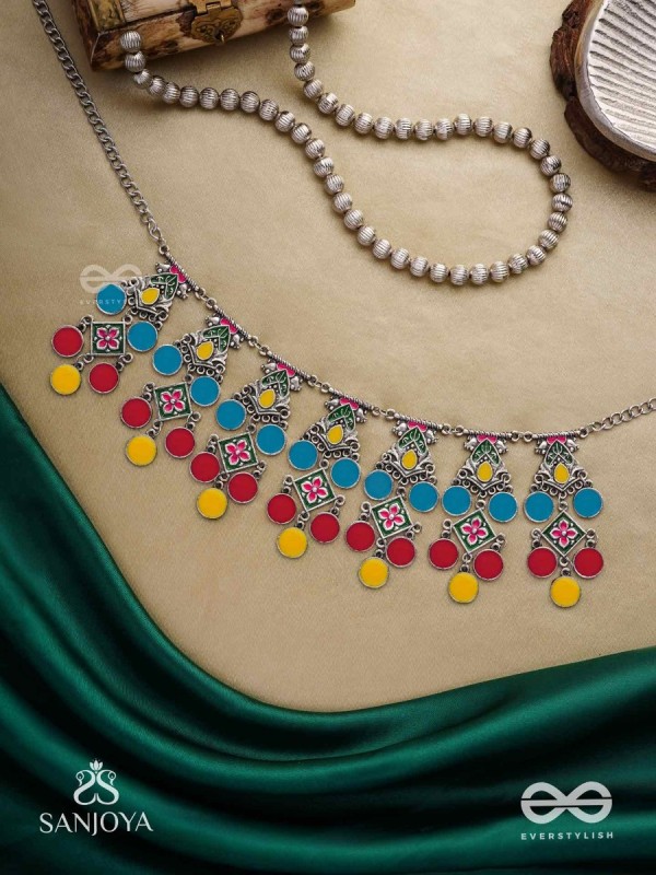 Manjari- Blossom Chain-Slender metallic chain with cascade of enamel designs.