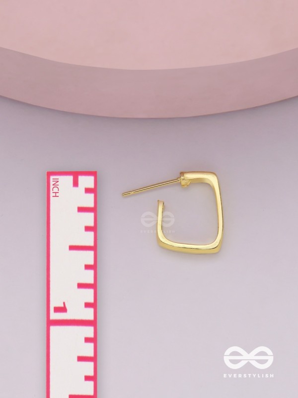 Golden glimmer- Golden colored rectangular  hoop earrings 