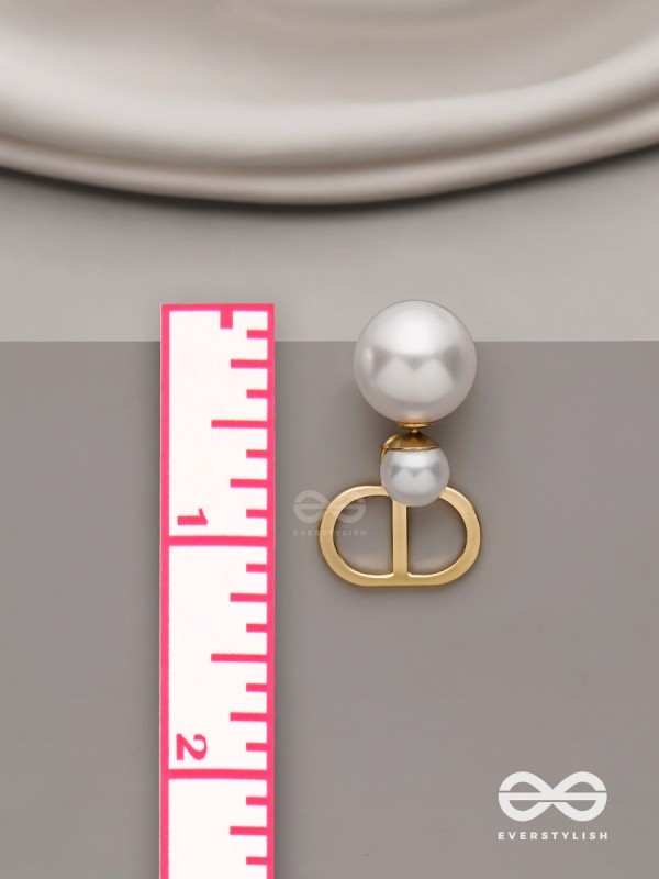 Starlit orb- dangling pearl earrings with golden spheres 