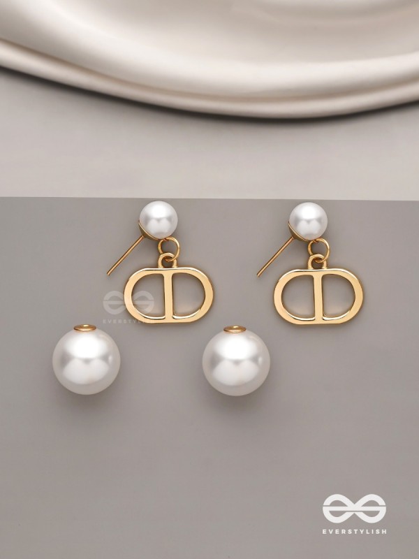 Starlit orb- dangling pearl earrings with golden spheres 