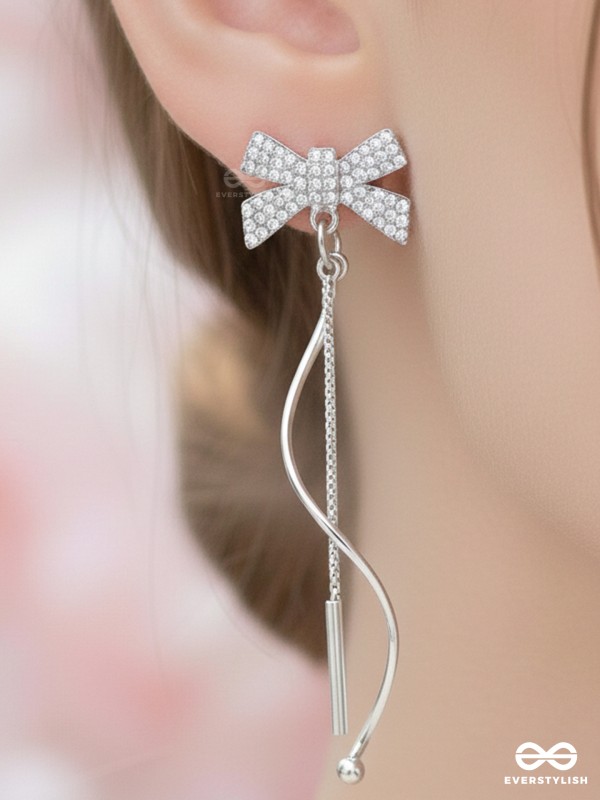 Starry Knots- Dangling Silver Cubic Zirconia Earrings 