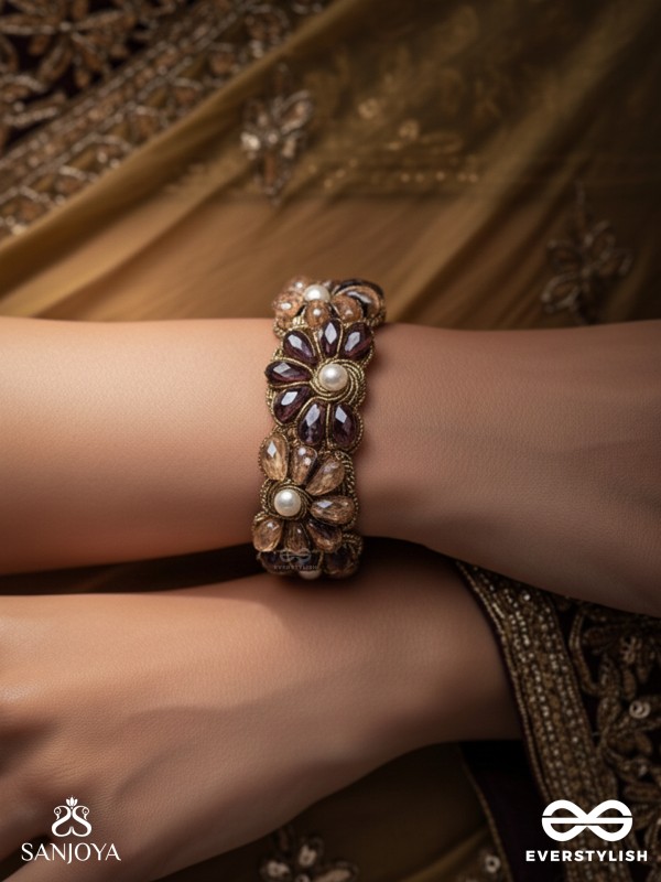 SHYAMALIKA – DARK BLOOM A FLORAL-INSPIRED BRACELET ADORNED WITH DARK-HUED GEMSTONES AND PEARLS