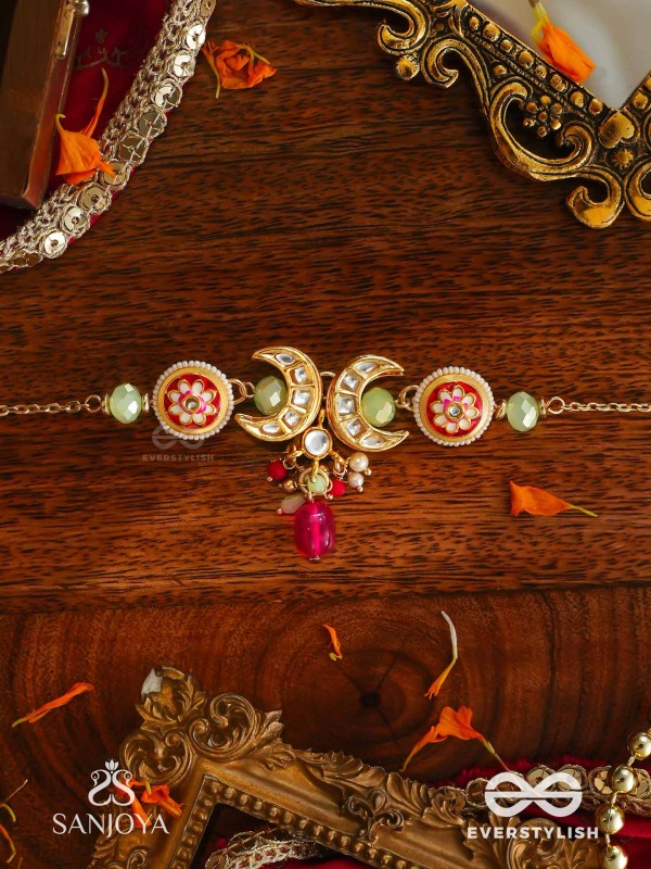 SHONAPRABHA- RADIANCE OF GOLD AND RED- HANDCRAFTED KUNDAN CHOKER  WITH GOLDEN MOONS AND RED BEADS