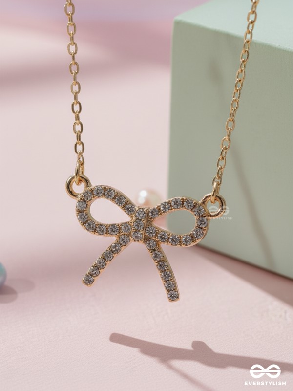 TIED IN GOLD- MINIMALIST BOW NECKPIECE