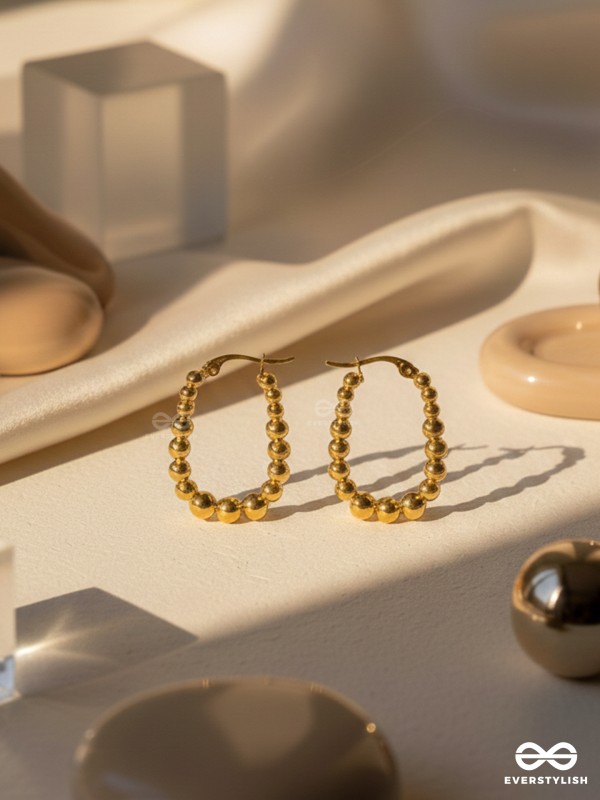 SUNBURST HOOPS – DELICATE DROP-SHAPED STAINLESS STEEL EARRINGS