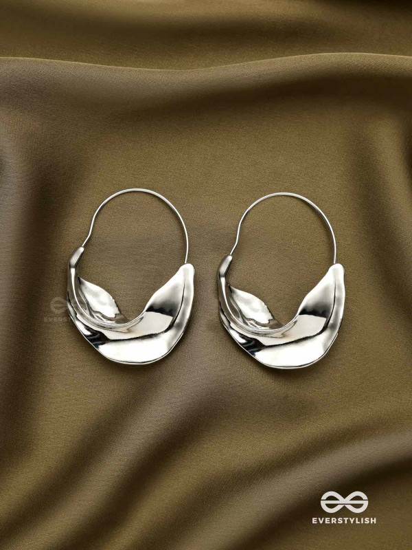 SILVER DRIFT- SCULPTED SILVER HOOPS WITH A FLUID