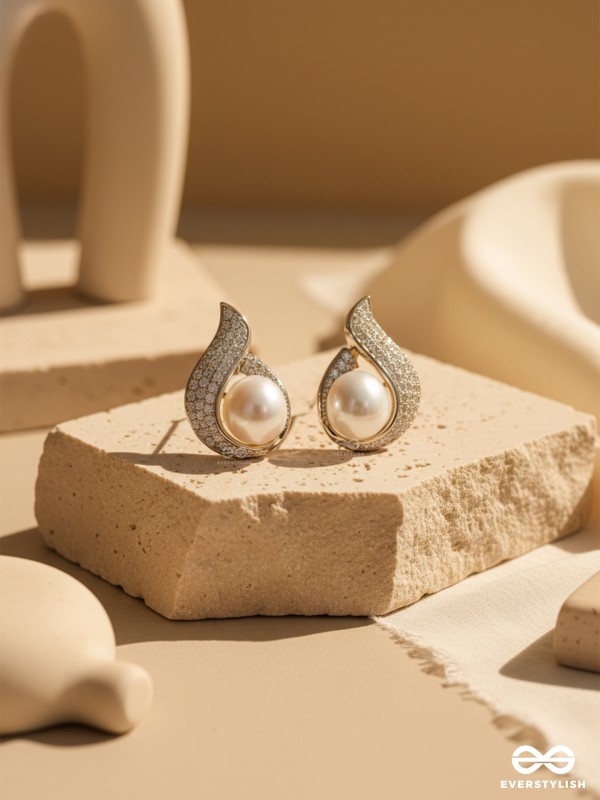 THE MOON WHIRL – GLEAMING PEARL STUDS WRAPPED IN CELESTIAL SWIRLS