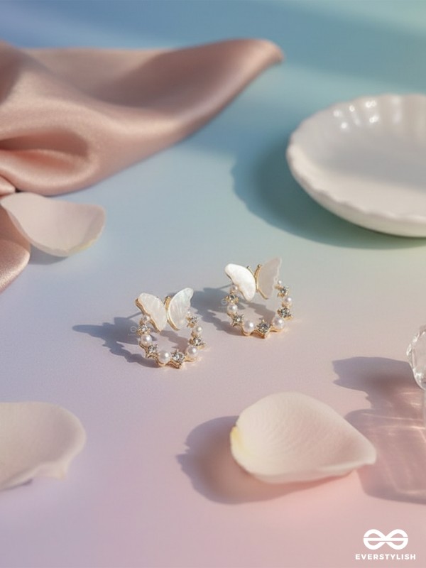 WINGED WHIMSY – DELICATE BUTTERFLY HOOPS WITH SHIMMERING PEARLS