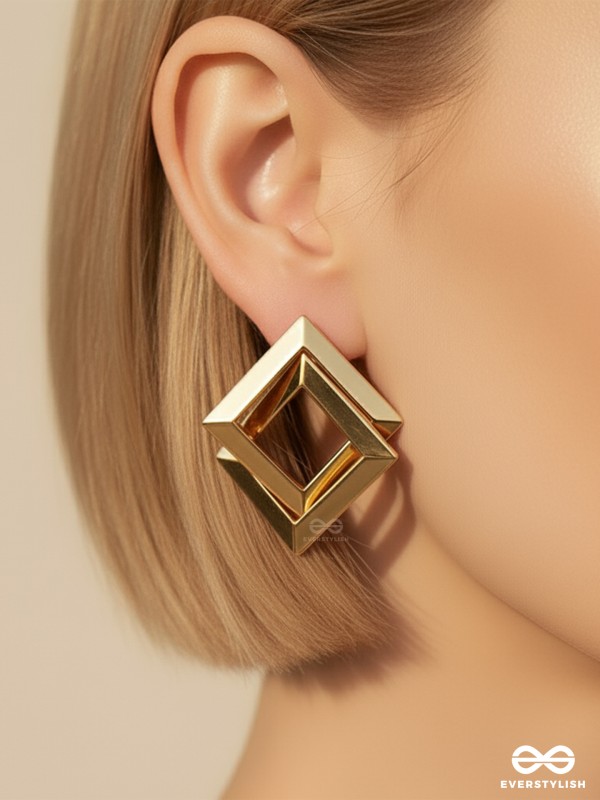 GOLDEN DIMENSION –  OPEN CUBE STATEMENT EARRINGS