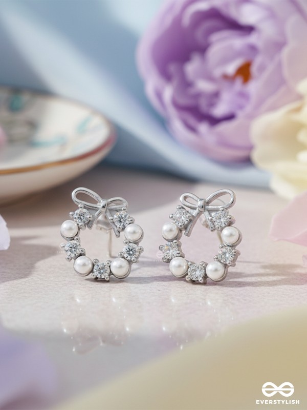 RIBBON PEARL – LUSTROUS BOW-TOP SILVER EARRINGS