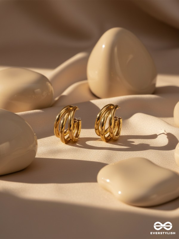 The Elegant Statement Makers - Golden Stud Earrings