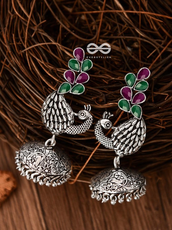 The Dancing Peacocks Engraved Jhumkis (Ruby Emerald) - Embellished Oxidised Collection