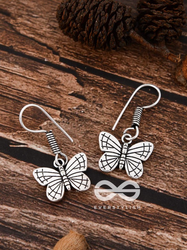 The Cutesy Butterfly Danglers - Tiny Trinket Earrings