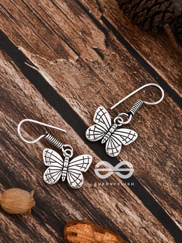 The Cutesy Butterfly Danglers - Tiny Trinket Earrings