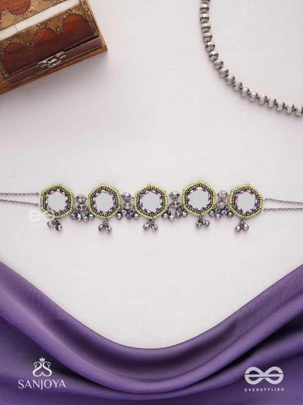 Chāyāmālā-Reflective choker- oxidized choker featuring intricate beadwork, mirrors, ghungroo (small bells), and thread details