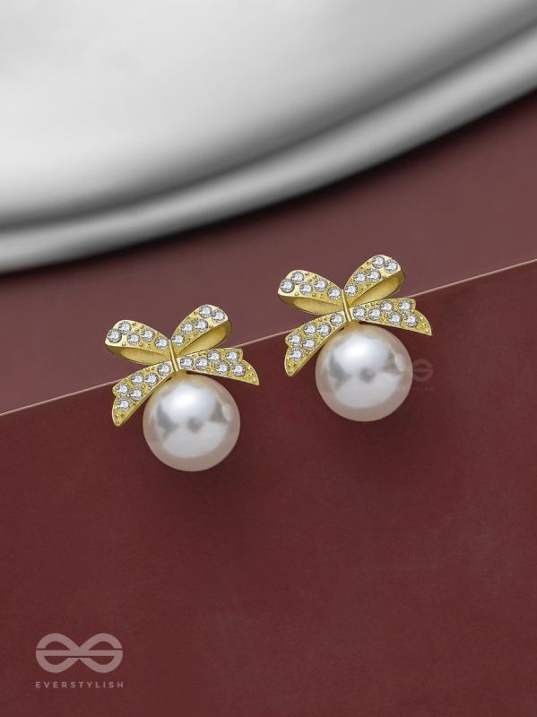 BOW-DAZZLE PEARLS - GOLDEN AND WHITE EMBELLISHED EARRINGS