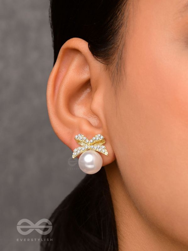 BOW-DAZZLE PEARLS - GOLDEN AND WHITE EMBELLISHED EARRINGS