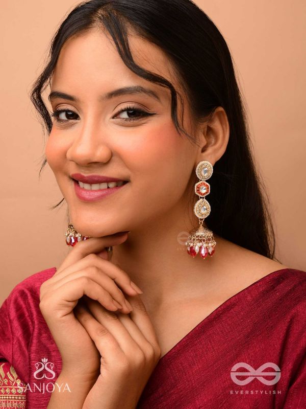 Suvarnmani - The Golden Gem –Golden enamel earrings adorned with gemstones and dangling beads