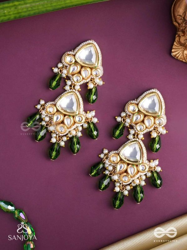 Kundalāṅgī-Kundan Elegance- Traditional pearl and Kundan earrings adorned with beads, stones, and green danglers for a regal touch.