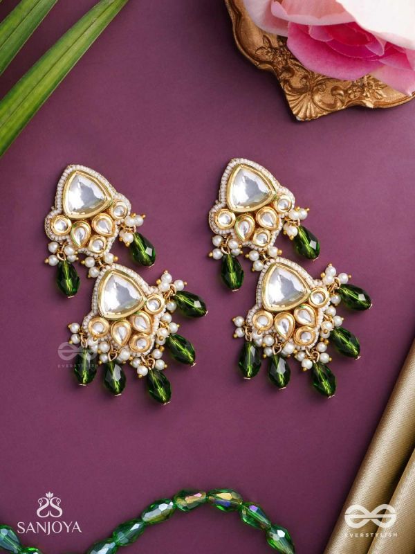Kundalāṅgī-Kundan Elegance- Traditional pearl and Kundan earrings adorned with beads, stones, and green danglers for a regal touch.