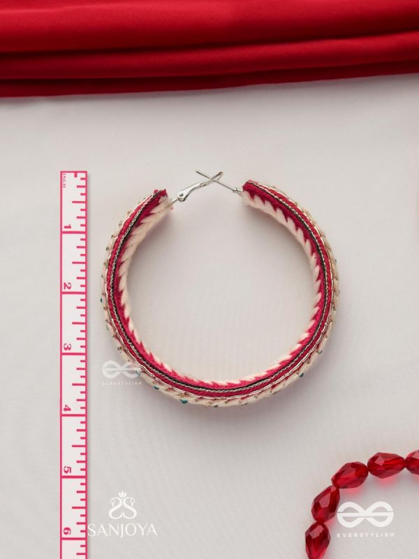 Vasantiruchi- Spring Charm- Embroidered earrings with red and white threads, decorated with beads and gold accents