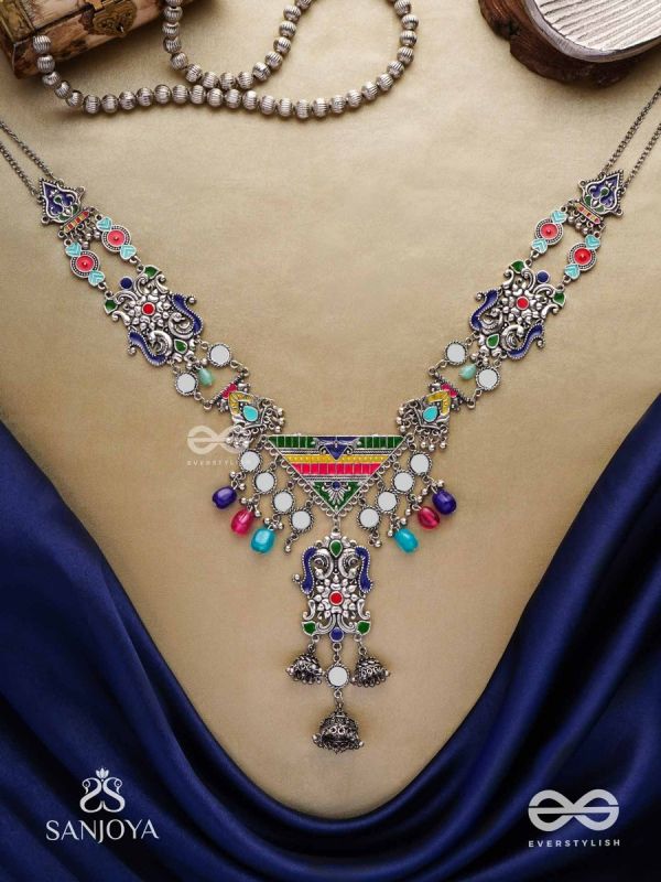 Prema raga- Love colour- Enamelled oxidized neckpiece embellished with beads, mirror and dangling jhumka.