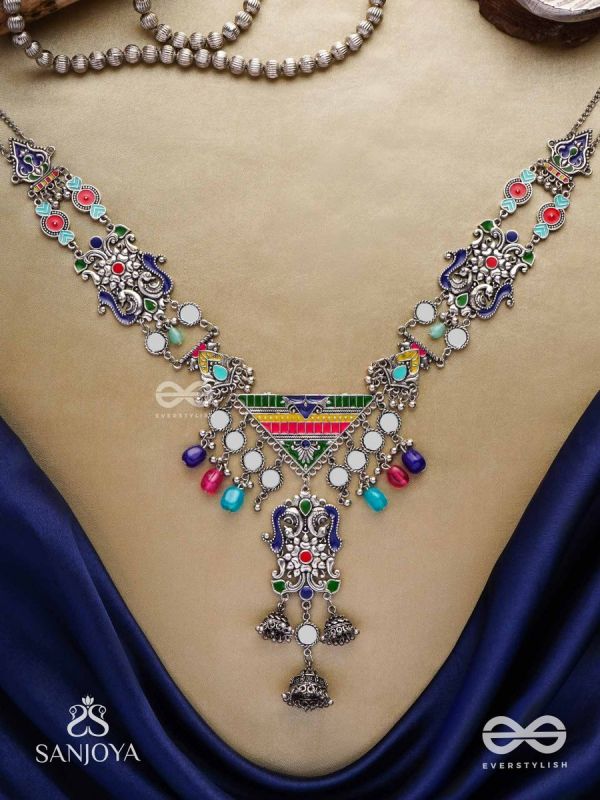 Prema raga- Love colour- Enamelled oxidized neckpiece embellished with beads, mirror and dangling jhumka.