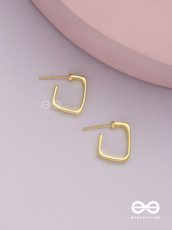 Golden glimmer- Golden colored rectangular  hoop earrings 