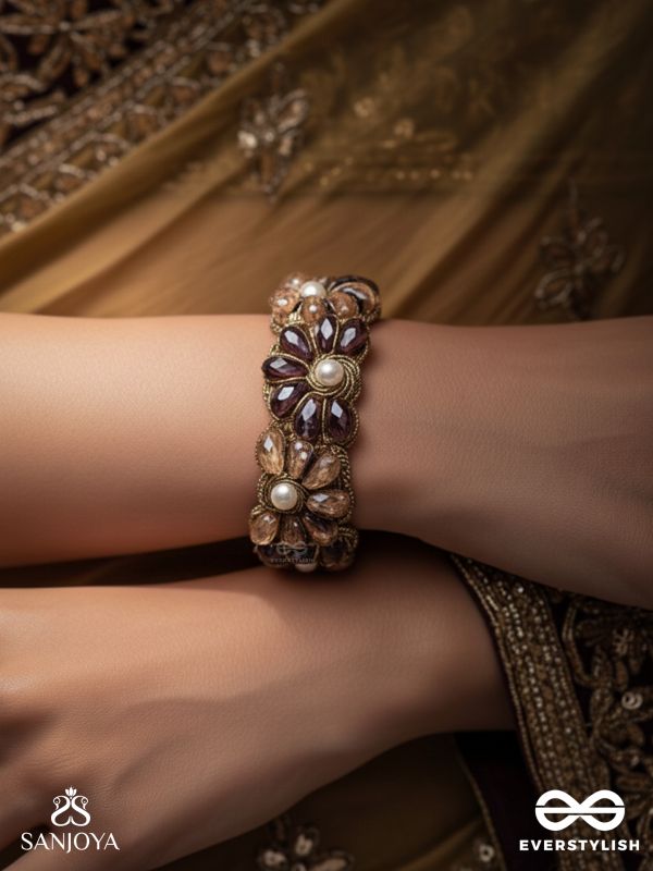 SHYAMALIKA – DARK BLOOM A FLORAL-INSPIRED BRACELET ADORNED WITH DARK-HUED GEMSTONES AND PEARLS