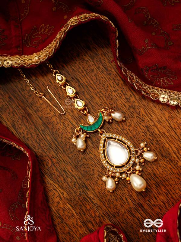 RATNODYA - RISING GEM - DAZZLING KUNDAN MAANGTIKA WITH PEARLS AND ROYAL GREEN AND GOLD ACCENTS