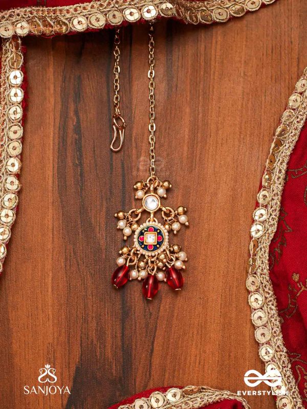 RUDRARAGA - MELODY OF RED - INTRICATE KUNDAN MAANGTIKA WITH RUBY BEADS AND GOLDEN DETAILS