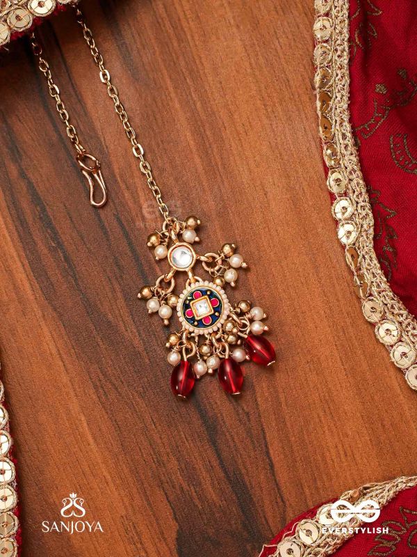RUDRARAGA - MELODY OF RED - INTRICATE KUNDAN MAANGTIKA WITH RUBY BEADS AND GOLDEN DETAILS