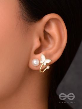 A WINGED WONDER - GOLDEN AND WHITE EAR JACKETS