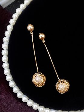 Hanging on a string, Pearl in a Cage of Gold Earrings