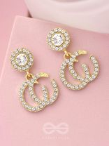The Lunar Eclipse- Solitaire and Rhinestones Studded Golden Earrings